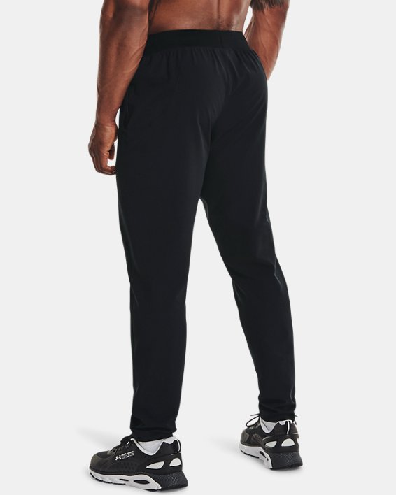 Men's UA Unstoppable Tapered Pants in Black image number 3